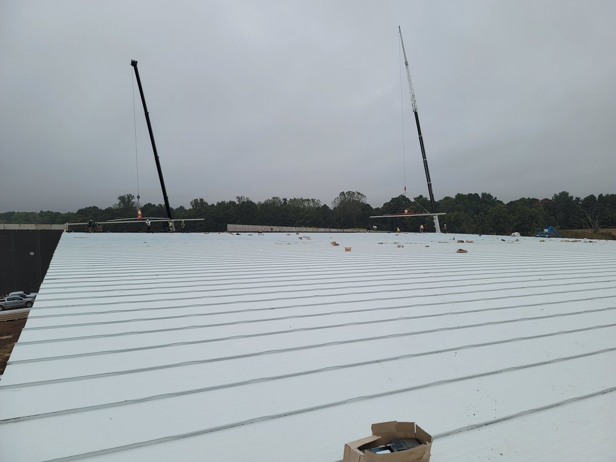 2 cranes is faster then 1 :-) Moving right along on this 4 acre build in tillsonburg.  Steel frame and sandwich panel roof done in sections here.