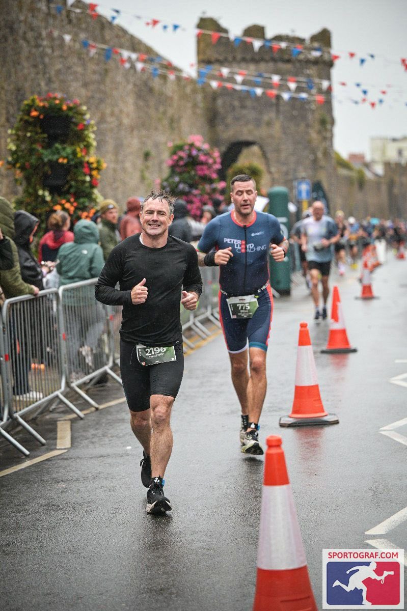 4 pictures of my day out in Tenby the crowd was amazing considering the weather in the latter stages never fading even on the second time up heart break hill at 175km in and in the dark and rain