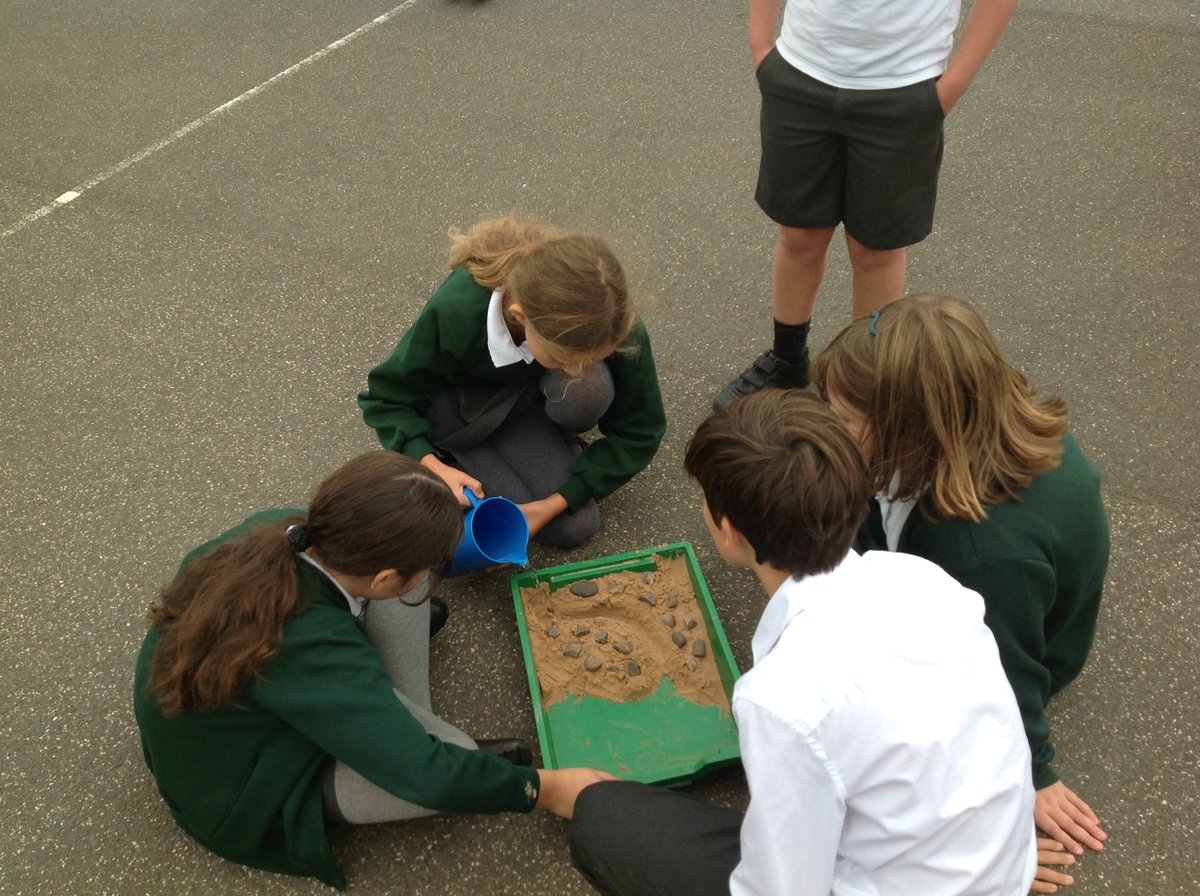 CrocClass's tweet image. Crocodiles Class were very excited this afternoon while modelling the processes of erosion and deposition in Geography.  They really enjoyed making a meander out of sand and watching the effect of the water as it flowed through!  @WillowsCE