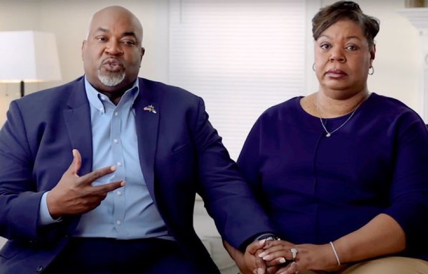 ArtCandee's tweet photo. Mark Robinson’s wife looks like she knows he was peeing on her sister. https://t.co/aVn5oHVbL4