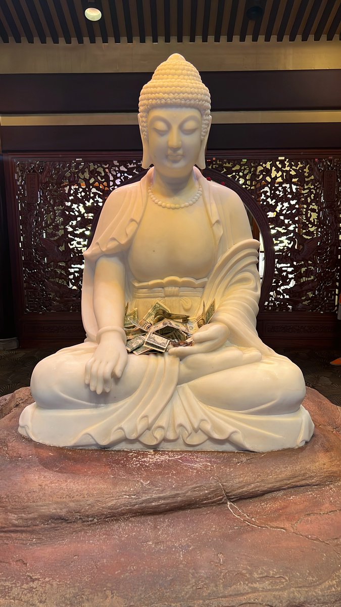 WeeklyTarot's tweet photo. Share this Buddha of abundance I found in Epcot to have a rain of money before the month ends. https://t.co/XfcTdq8qqR