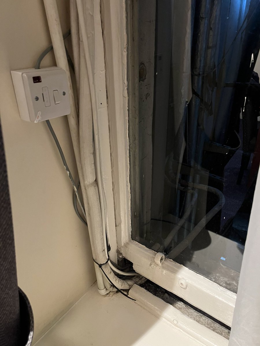 Ever wondered how to deal with that awkward cable run problem? Don’t worry! The Old Waverley hotel has an elegant solution to inspire us all … who needs a service duct when you could just chop a chunk out of the window and lob them out?