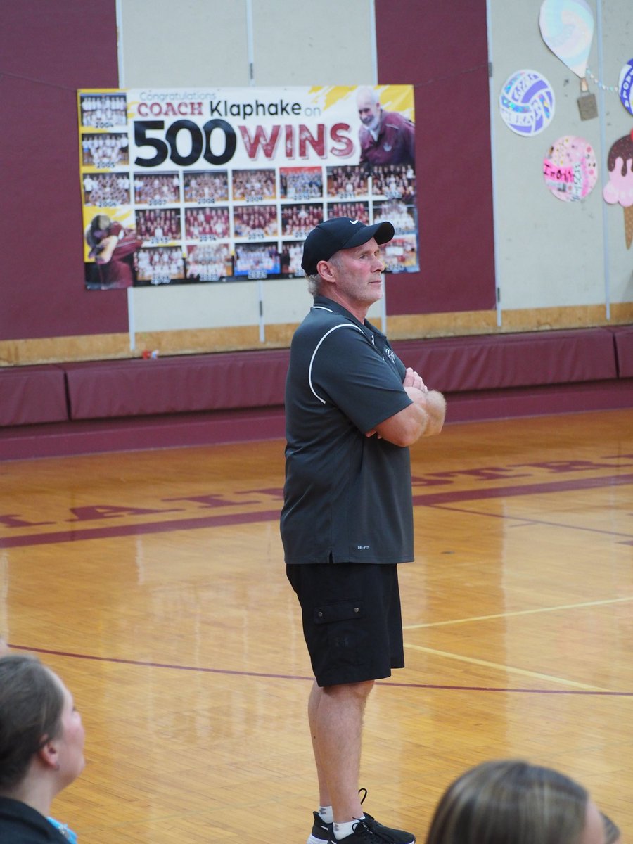 MinnesotaMillea's tweet photo. A poster in the Sauk Centre gym honors coach Jim Klaphake for recording his 500th career win earlier this season. https://t.co/KmtGWIJ0km