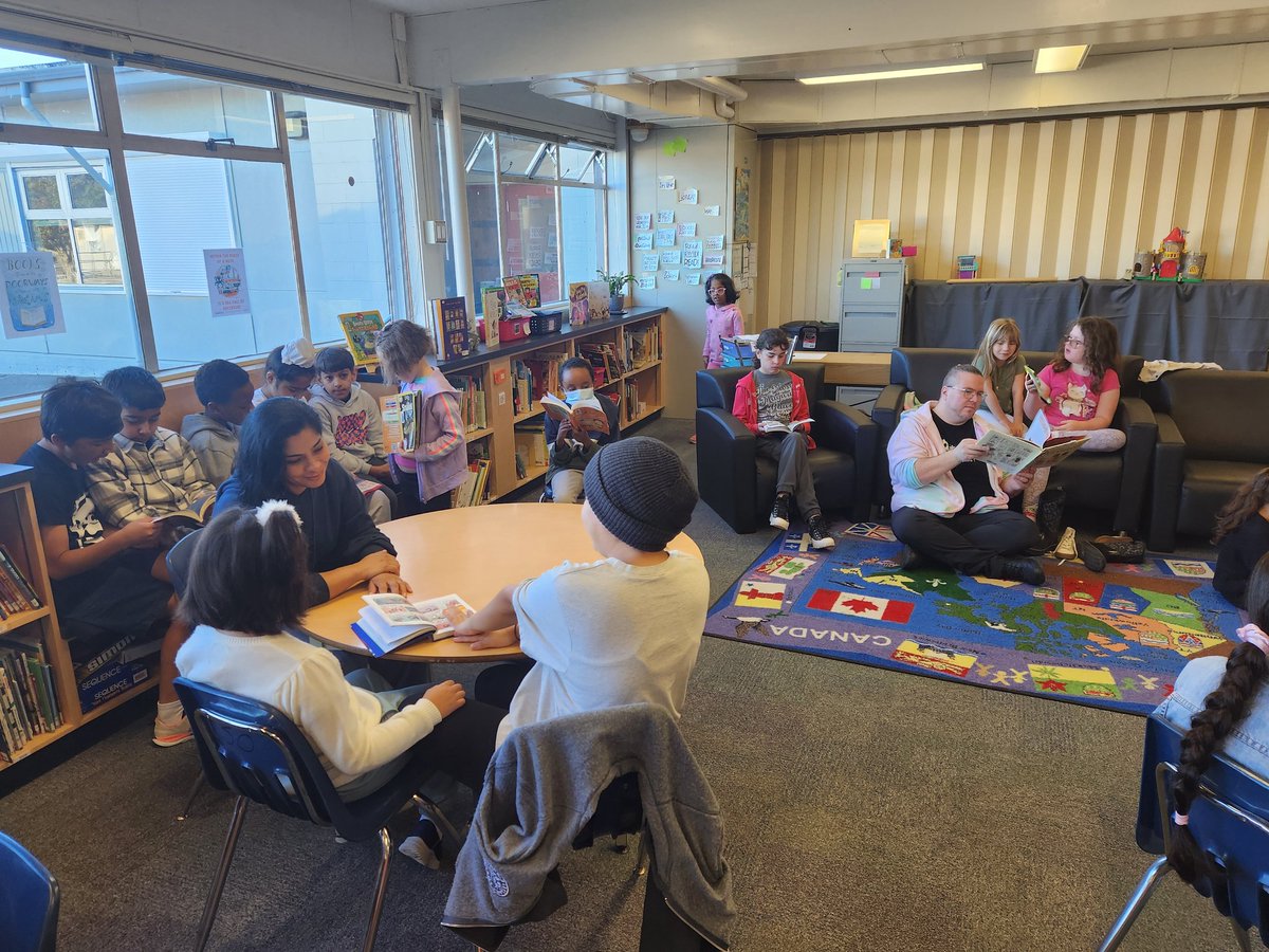 Our #LLC was hopping today for our first #FamilyReads morning at @jamesardielelem. So many students read with their families, big buddies, peers, and teachers. Students also visited to check out books to read almost anywhere they wanted to around the school. #sd36tl #sd36learn