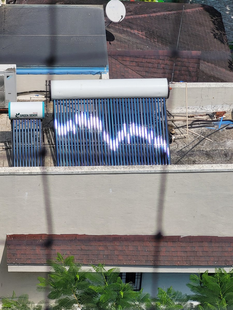 AganitRaviSashi's tweet image. #physics #physicstwitter Question-  Why would the sun reflect like this off a tubular solar water heater? Shouldn&apos;t all the streaks be in a straight line? Pics taken from different angles #SolarPanel #Solar