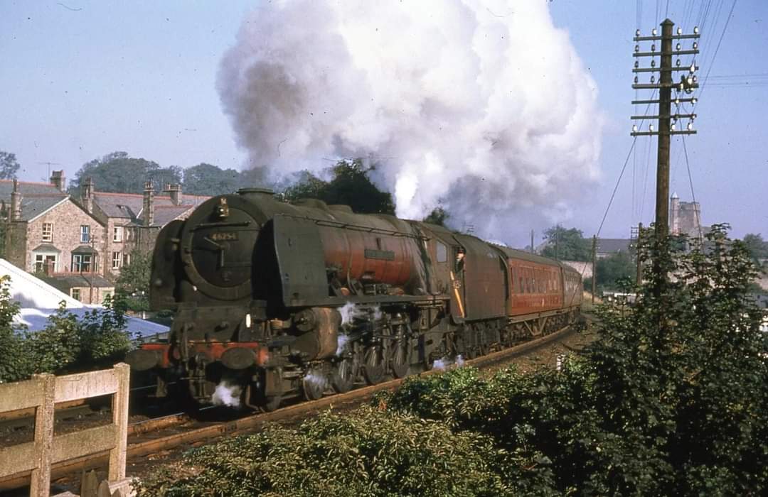 adipullenLNER's tweet photo. ColourRail slide, BRM403 ex LMS 46254, 'City of Stoke on Trent' thumps up past Lancaster Old with the 08.50-Crewe, a fine shot taken on her last run before withdrawal. September 1964. 
📸 EC https://t.co/EWU6xrP9jO