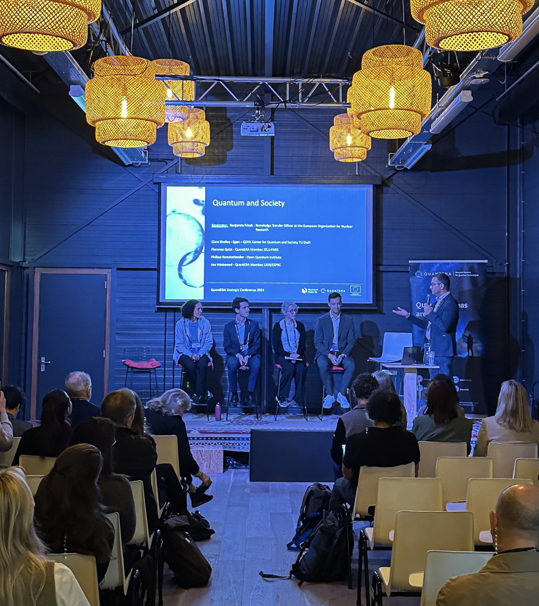 The panel “Quantum and Society: Quantum for Society or Society for Quantum?” is underway. 🌍 How may quantum technologies learn from – and subsequently address – broad societal challenges? Join us as we explore the ethical and societal dimensions of #QuantumInnovation. #QuantERA