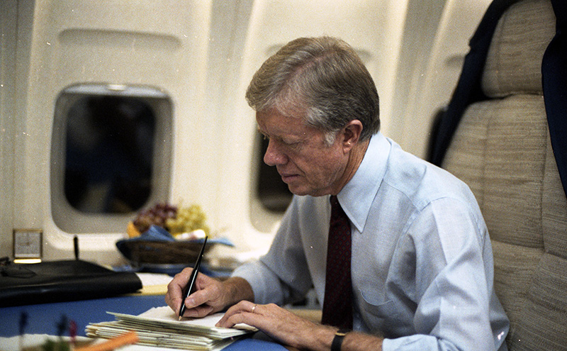We’re only 6 days from Pres. Carter’s 100th birthday! Join us this weekend for a Fun Run &amp; film festival! Pic: Pres. Carter working on Air force One, headed to NYC to address the annual Convention of the American Public Transit Association, #OnThisDay1979. #JC100
 NAID 841331