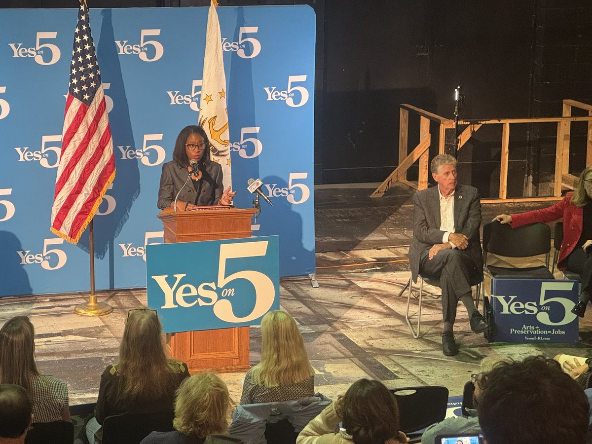 CommerceRI's tweet photo. We’re here @TrinityRep w/ our CMO Anika Kimble-Huntley and leaders from across RI to support Question 5 on the ballot — a proposed $10M investment in the arts. 🎭 

Our diverse arts &amp; cultural sector is a job-creating economic engine that benefits all Rhode Islanders. 

#Yeson5RI https://t.co/Qm6bVrBKuA
