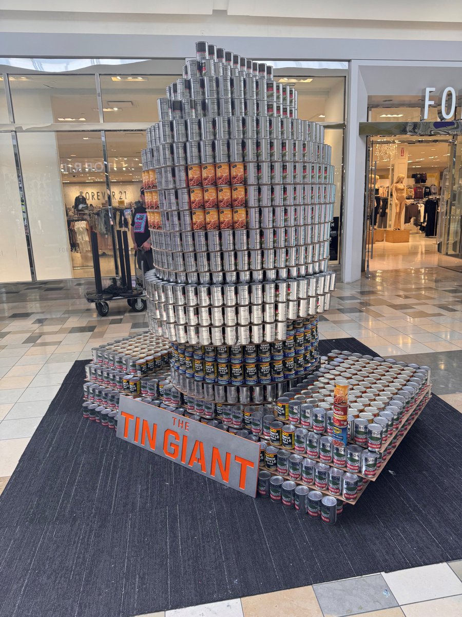 VLKArchitects's tweet photo. The VLK Fort Worth office had a blast competing in this year’s CANstruction Fort Worth event! Celebrating 25 years, the theme was “Let’s End Hunger Like It’s 1999,” and our team partnered with RWB to create The TIN Giant. #VLKArchitects #CANstruction https://t.co/UfT8Xoou41