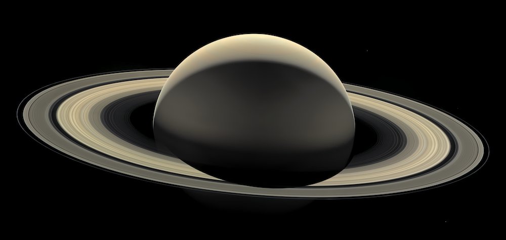 Saturn in all its immense glory. The ancients named this planet after the Roman god of time, agriculture, wealth, and abundance. And yet all they knew of the planet was that it was a bright, wandering dot in the sky. 

It wasn't until the advent of telescopes in the 17th century