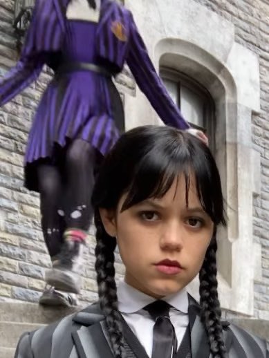 yuripiIIed's tweet photo. The posture. The skipping. Wednesday angry face. The black and white versus vivid purple and glitter. Welcome back wenclair, our fav storm cloud x sunshine couple https://t.co/D1bBAbWNfH