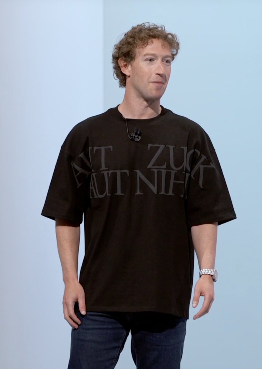 META CEO MARK ZUCKERBERG WEARING A SHIRT THAT SAYS 