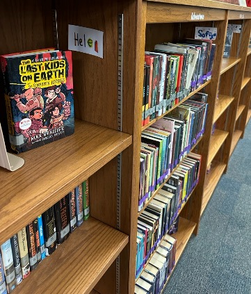 The library has a new club this year-Library Pages.  This hard working 4th graders will help keep the library nice and tidy as well as help with shelving and programming.  They have each adopted a shelf and it will be theirs to decorate and keep straightened!