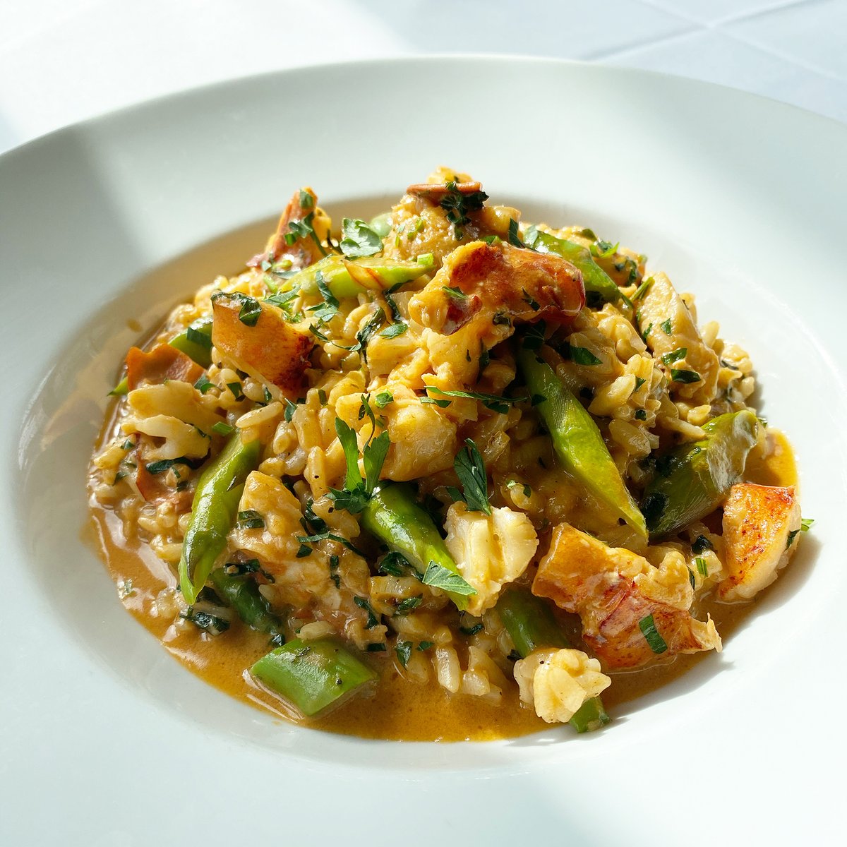 Celebrate National Lobster Day at Davio’s with our indulgent Maine Lobster Risotto! 🦞🍴 Savor every bite of this rich dish, featuring tender lobster, asparagus, fresh herbs, and a luscious lobster cream! #NationalLobsterDay #Davios #LobsterLovers