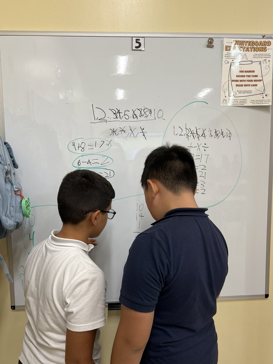 Anna_Morella1's tweet photo. Math Talk is in full swing w/ @MsAbreus4th Grade classes! @S3_Belleville students had amazing math conversations @ the vertical whiteboards while completely engaged with @pgliljedahl BTC’s task: “The Answers Are!” They didn’t want their “thinking” to end! @School3MissBlake #BTC https://t.co/yrsZcJciMA