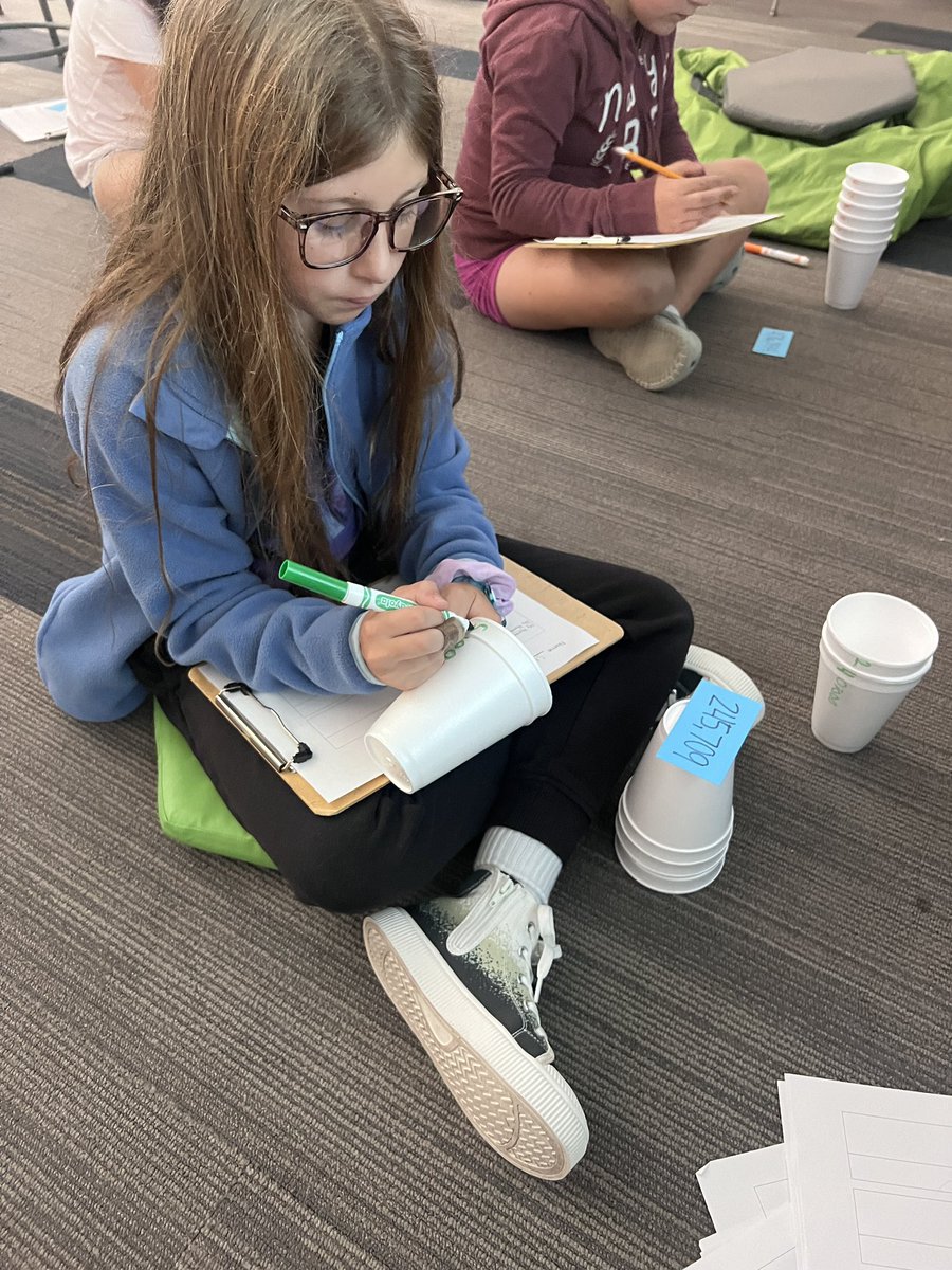 MrsWachholder's tweet image. Making math fun by using cups to help students write numbers in expanded form  #wcsflight #mathrocks #placevalue #handsonlearning #MakeMathFun @Reed_Reads009 @missuhen