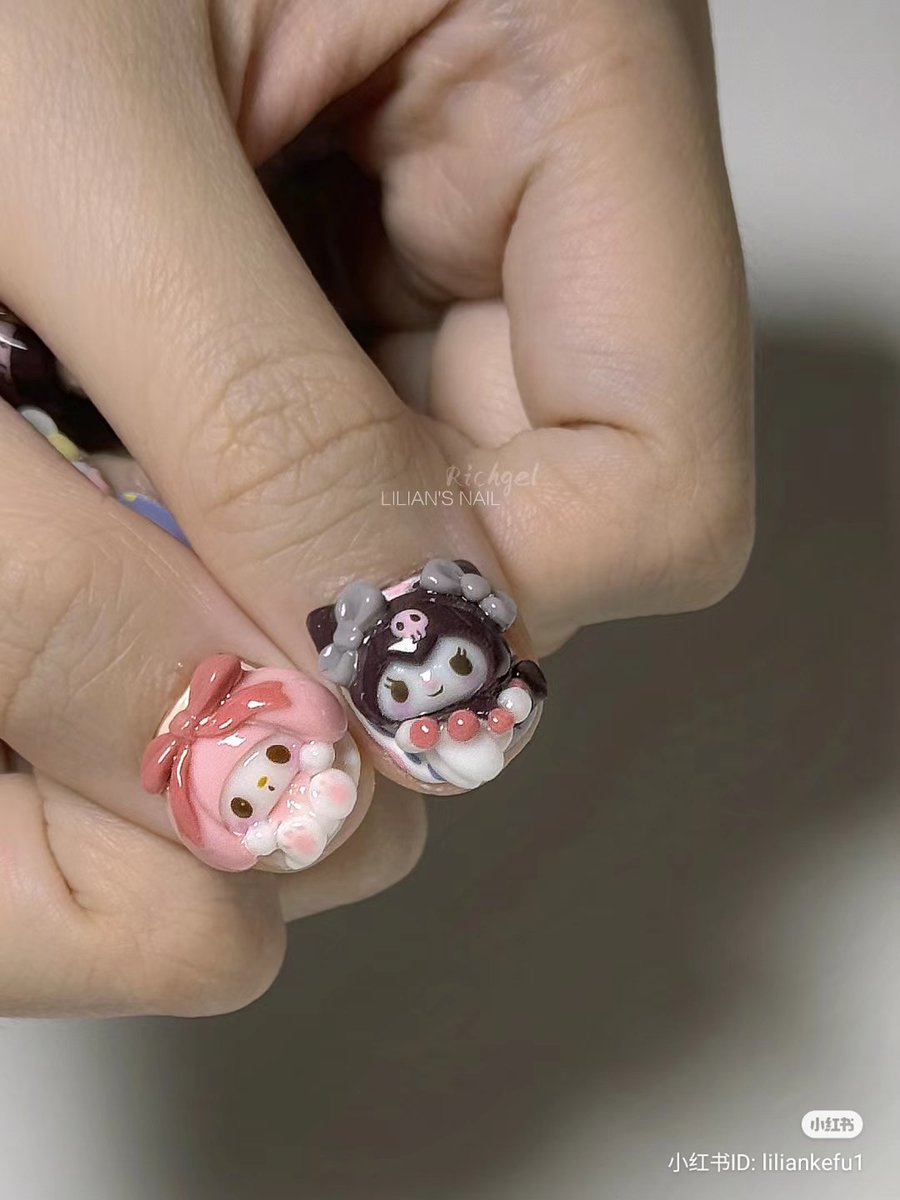 lovesickdoe's tweet photo. my melo &amp; kuromi nails https://t.co/Q0xHjbLprN