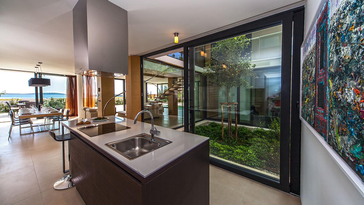 Escapiancom's tweet photo. Dive into luxury at Villa Golden Rays 7 in Primošten! 🌞🏖️ Experience modern elegance and breathtaking views with every stay. Perfect for your next dreamy getaway. Explore more at Escapian: https://t.co/7DLPE80Ec8 🌟✨ #TravelGoals #VillaLife #LuxuryEscape #Primošten https://t.co/ZNIFwSzm0n