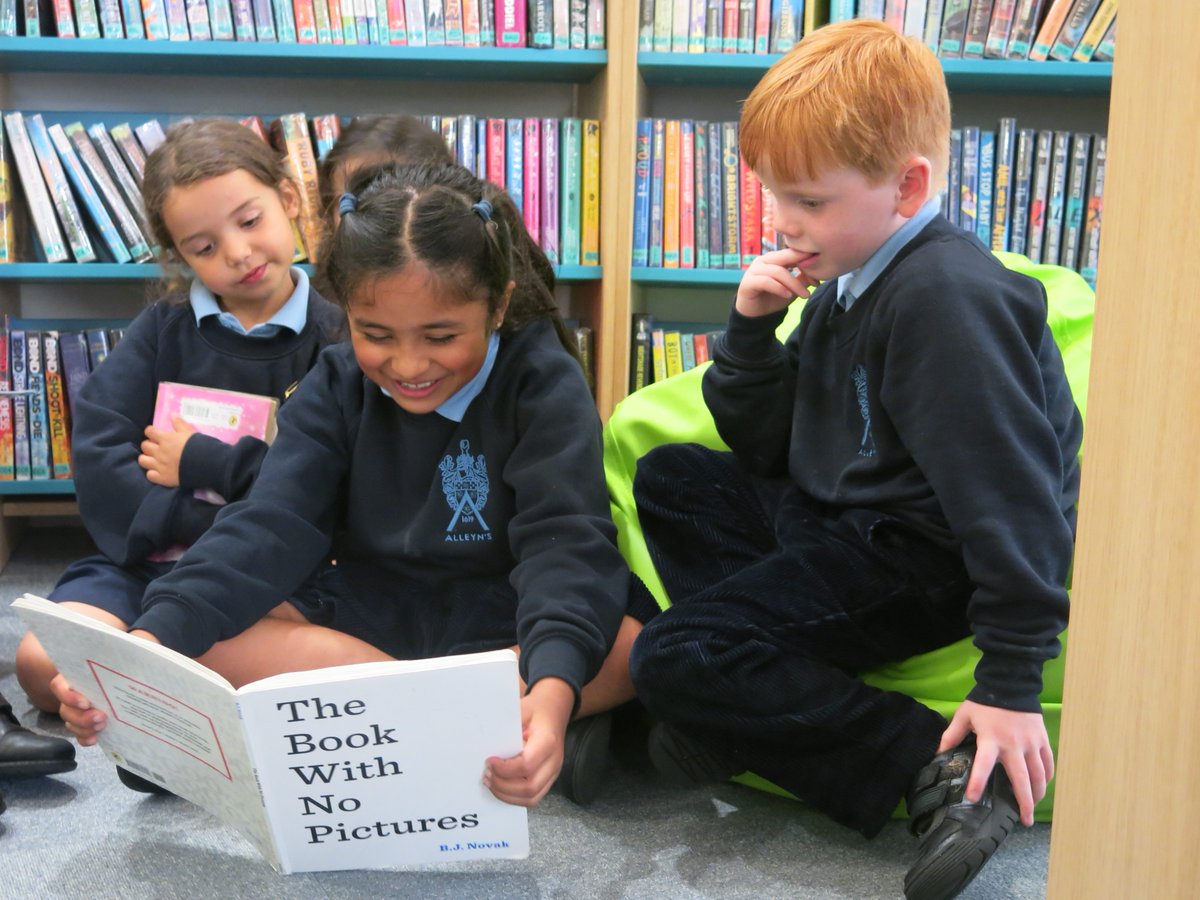 Alleyns_Junior's tweet photo. THIS is #readingforpleasure : reading a brilliant book with so much joy that your friends are literally falling about laughing. #AlleynsYear1 making the most of their library lesson today @bjnovak @officiallyofficialmo #AllWeCanBe #AlleynsLibrary https://t.co/uuv4RO77qT
