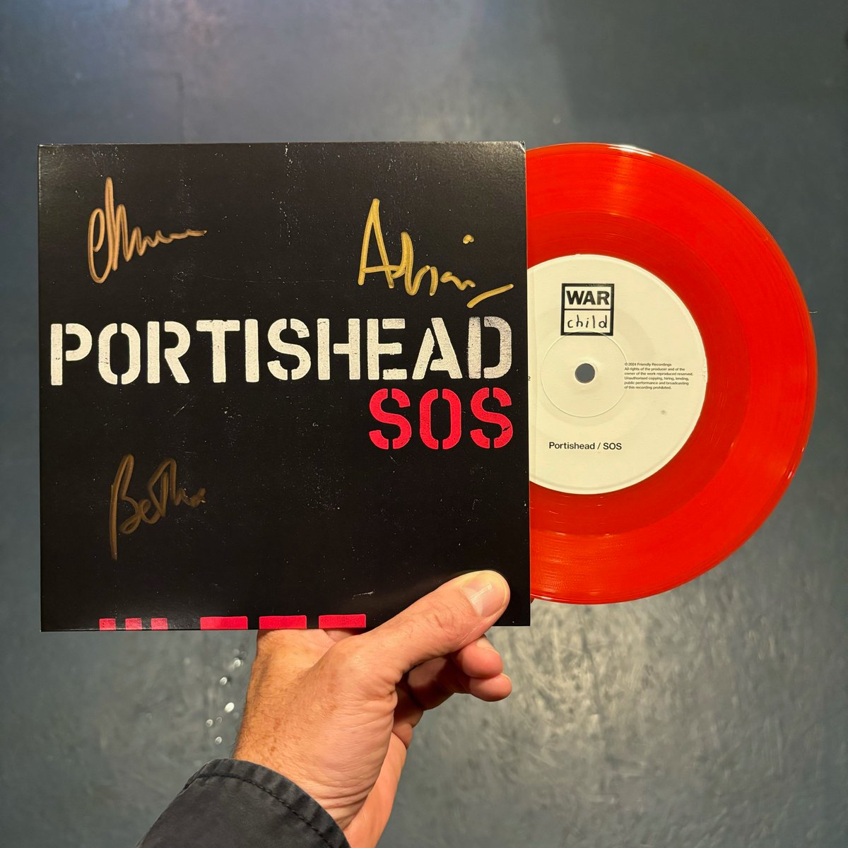 Portisheadinfo's tweet photo. Friendly Records Bristol will have the 100 red vinyl signed 7” Portishead SOS singles in aid of @WarChildUK available to buy in their Bristol shop from 11am tomorrow (Friday 27th Sept)... https://t.co/OusjsW31IK