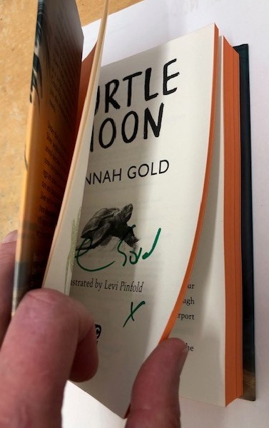 booknookhove's tweet photo. Happy book birthday to @HGold_author and Turtle Moon. We have a few signed copies and beautiful sprayed edges left! Such a gorgeous book #turtlemoon  (https://t.co/W0mUMyQ3Kb) #beautifulbooks #bookbirthday @HarperCollinsCh https://t.co/fRO2vHRlkb