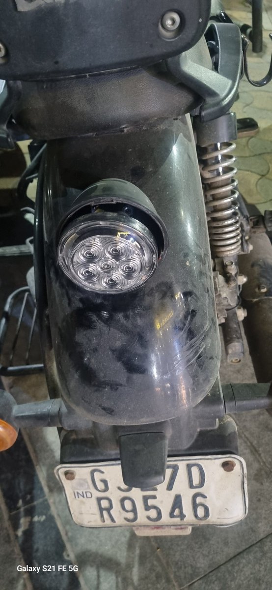 Amitesh87's tweet photo. @royalenfield @sidlal You claim your bikes made like a gun and this is how your gun is ripping apart on its own. While riding my meteor 350 the cap of its tail light came off on its own along with the screw collar. And on top of that your company has rejected the warranty claim. https://t.co/pBRl6c0pbl