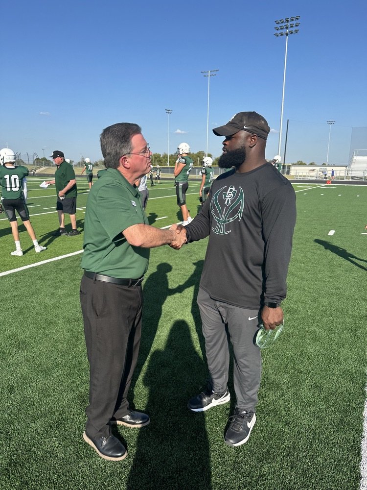 Dr. Floyd presented Coach Sims with a district coin for going Above and Beyond the Call of Duty (ABCD Award) for a middle school Lifeskills student today. Thanks Coach Sims! #BRISDpride #RaiseTheRidge
