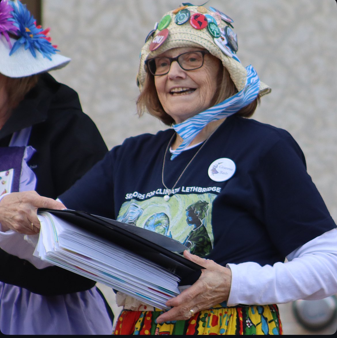 The wind was so bad at Tuesday’s seniors climate change rally but <a href="/BarbPhillips11/">Barb Phillips</a> managed to hang in as she performed with the Raging Grannies.