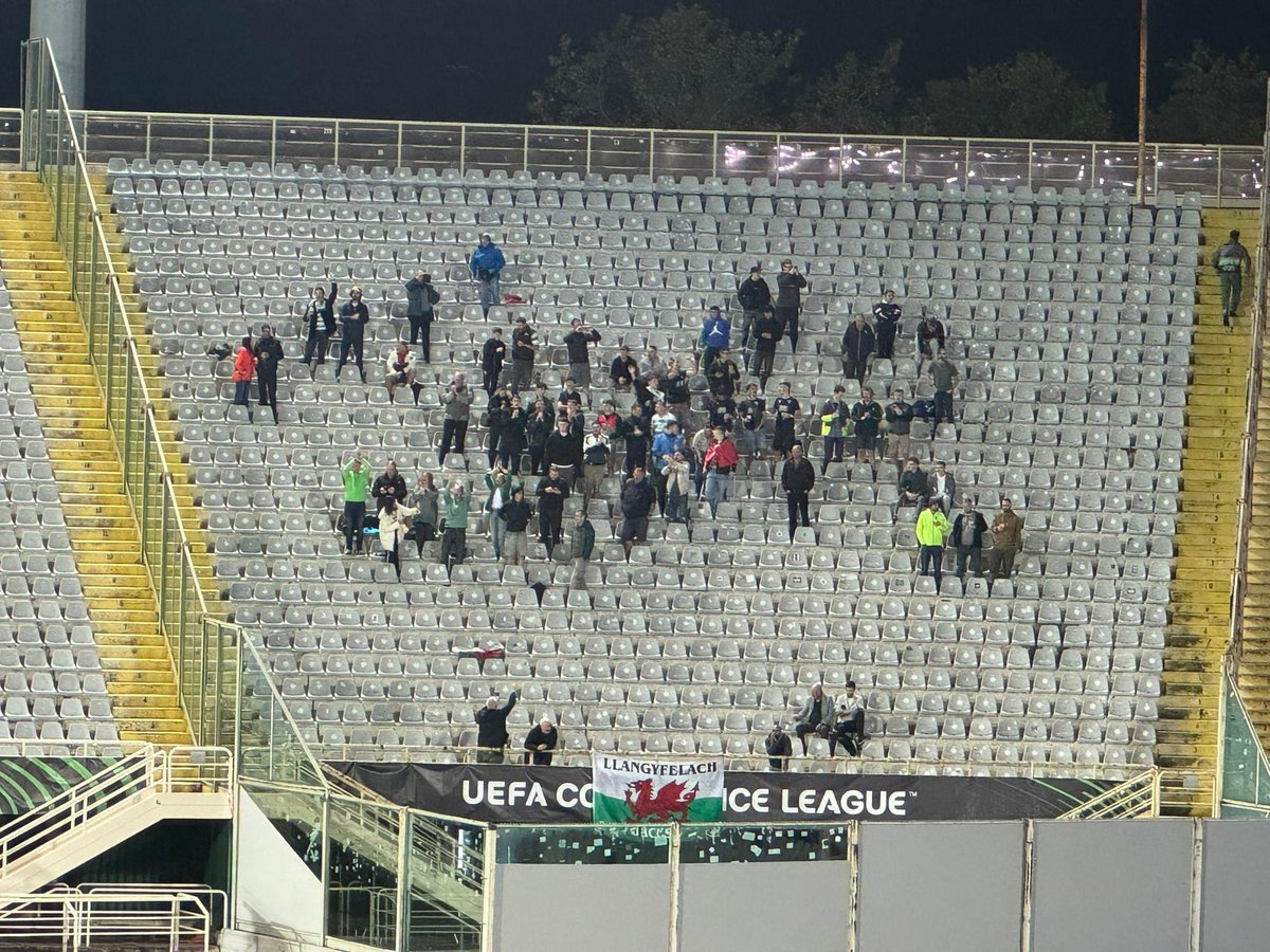 AwayDays_'s tweet photo. The small number of TNS fans who made the trip to Fiorentina tonight.

The first Welsh club to progress past the qualifying rounds of a UEFA competition🏴󠁧󠁢󠁷󠁬󠁳󠁿 https://t.co/dXv5YzenMp