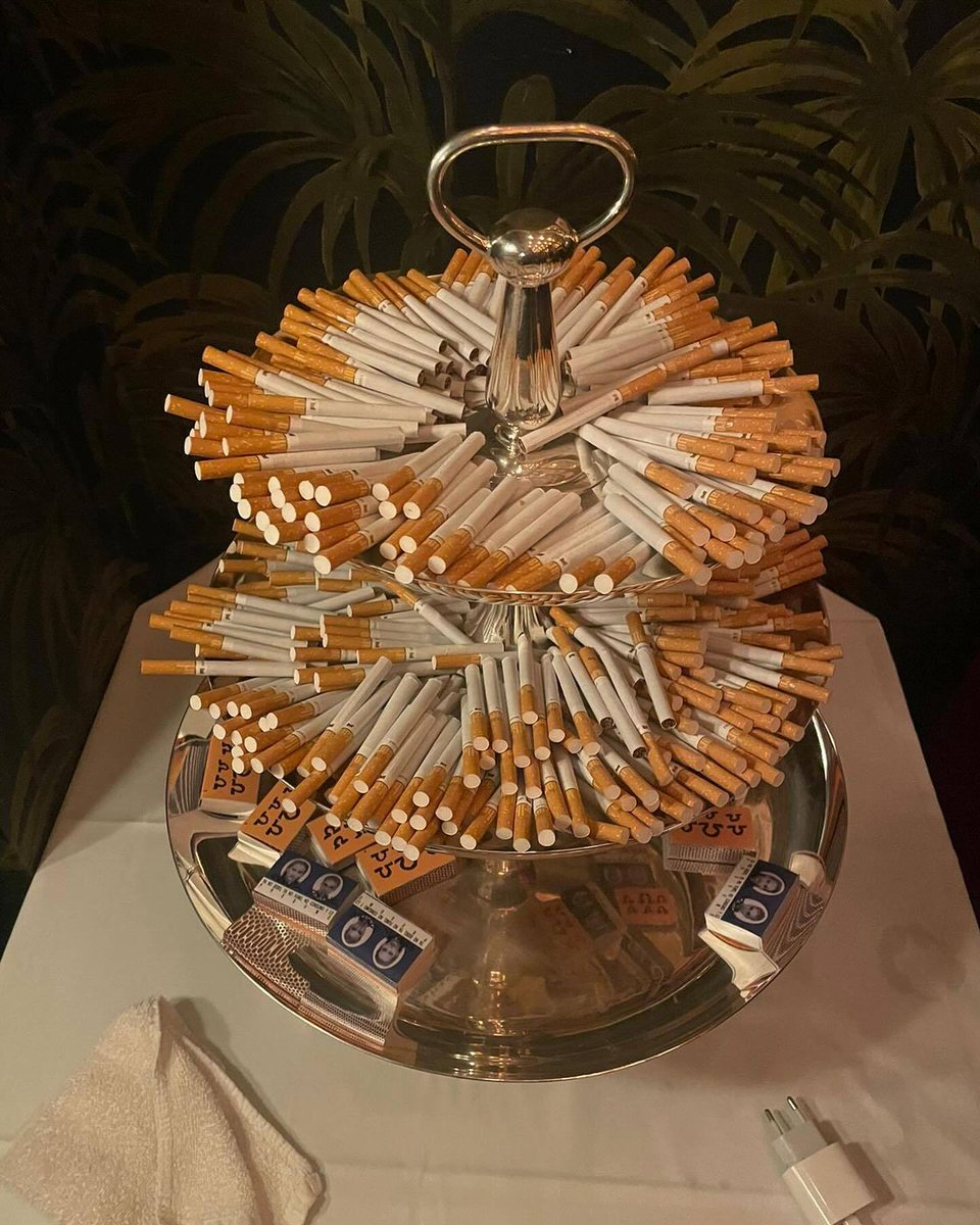 rosalia cigarette bouquet Rosalía having a tier of cigarettes at her birthday party 😭
