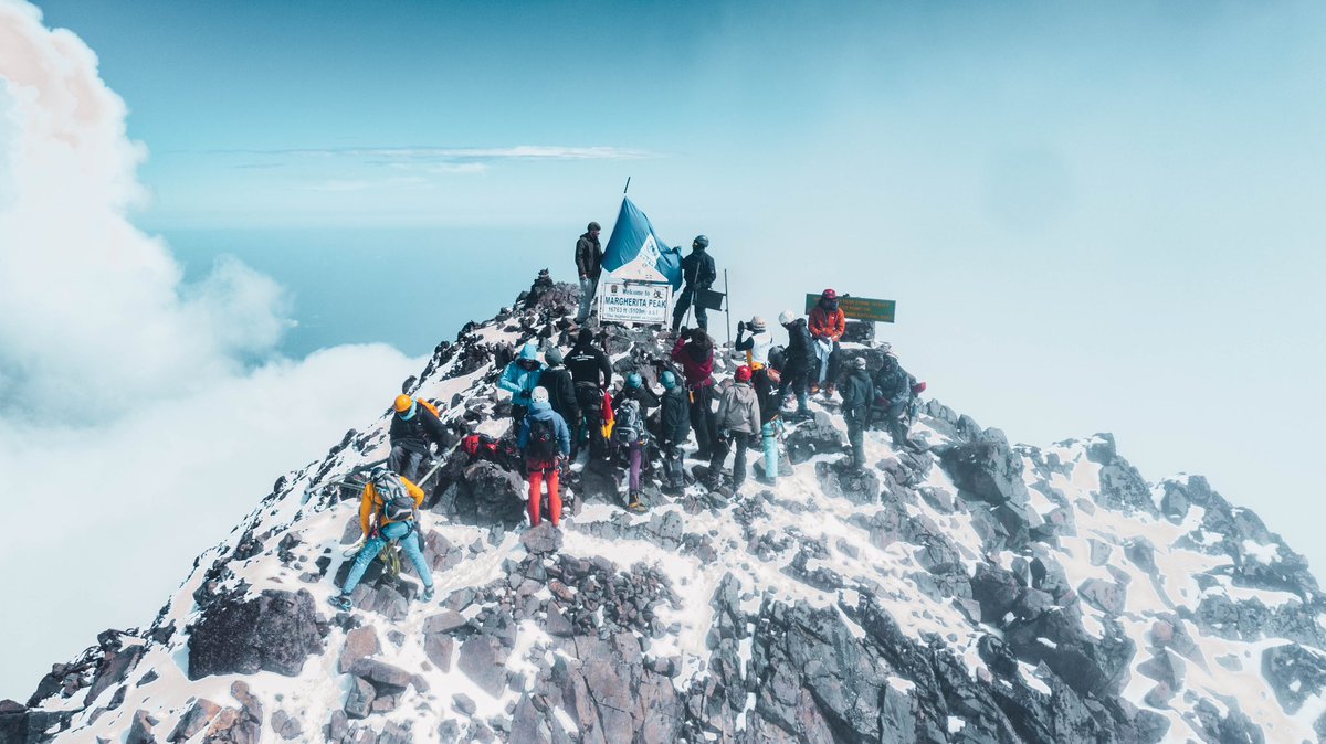 ExploreUganda's tweet photo. On this #WorldTourismDay, we shine a spotlight on the Rwenzori Mountains - also known as the Mountains of the Moon. 

This UNESCO World Heritage site is a symbol of Uganda’s rich natural beauty and biodiversity. From the snow-capped peaks to the green valleys, the Rwenzoris offer an adventure like no other

#ExploreUganda #WTD2024