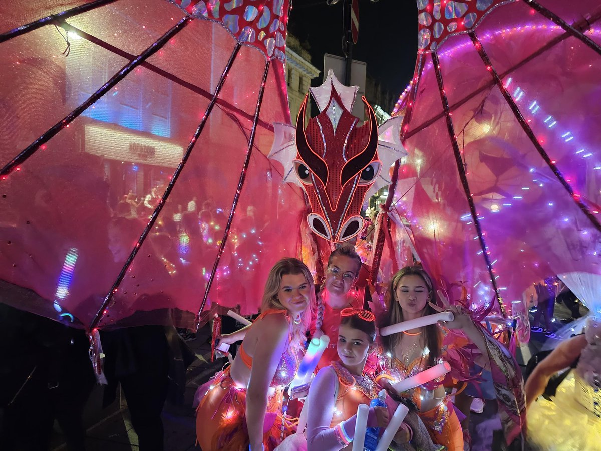 Carnival Dragon piece in lights at Encounter torchlight. Created by Kerith Ogden, Carnival Artist.