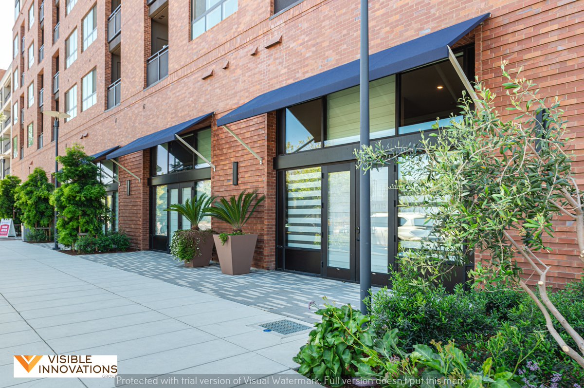A snap shot of our manufacture &amp; install metal awnings on a commercial building in Santa Clara, CA.