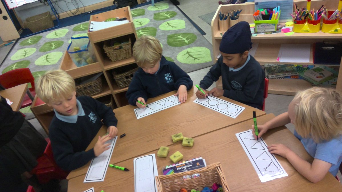 HambrookSchool's tweet photo. We have been super impressed with Reception using their initial sounds in their writing this week! On our mark making table, children have been using magnetic letters to spell their first words and follow patterns that aid in developing pre-writing skills #HambrookR https://t.co/g9XzpoTULO