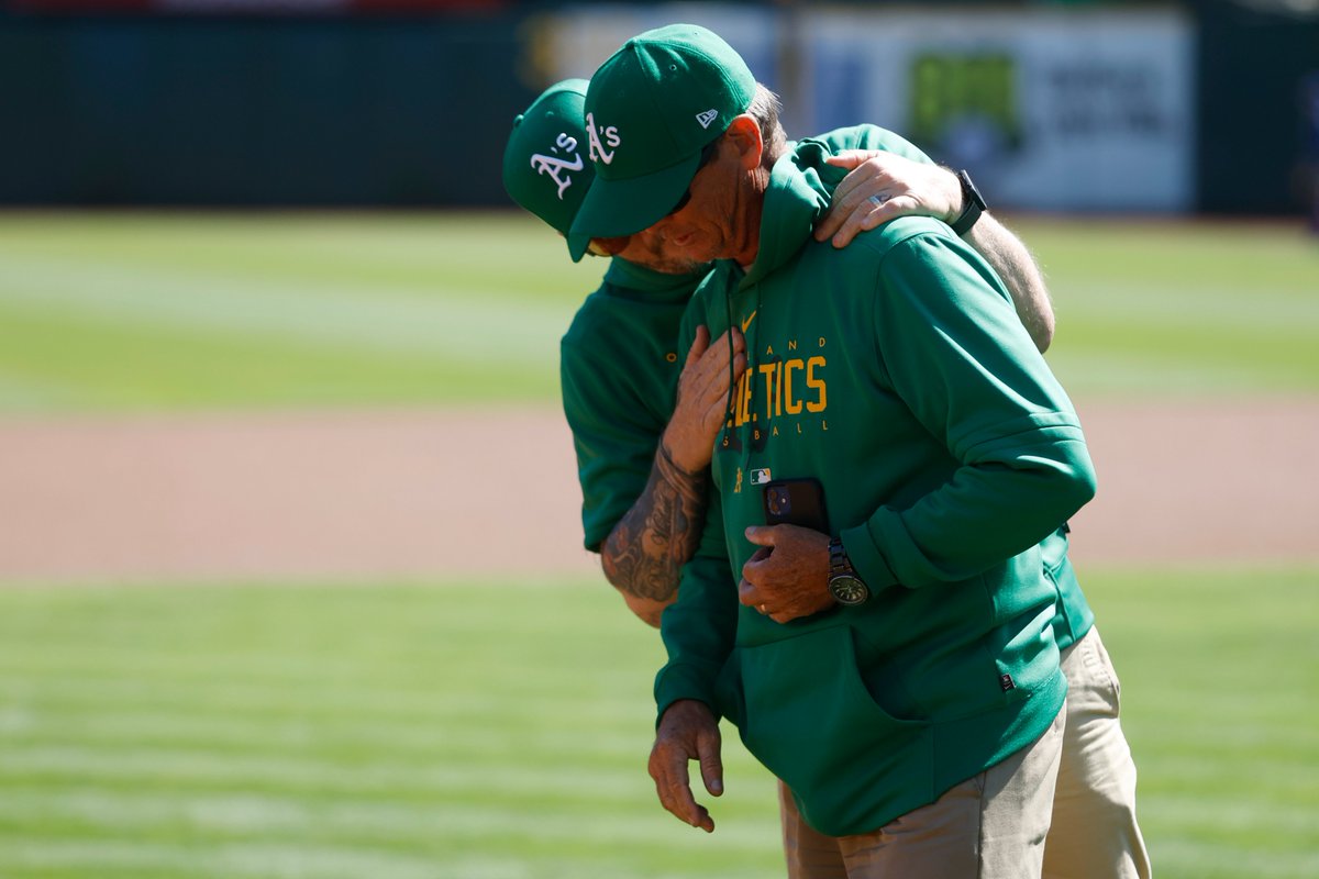 This is a powerful photo of A's head groundskeeper Clay Wood being consoled as he prepares the field at the Oakland Coliseum one last time.

This was Clay's 31st and final season with the club. Hundreds of others will lose their jobs.

(Photo by Lachlan Cunningham/Getty Images)