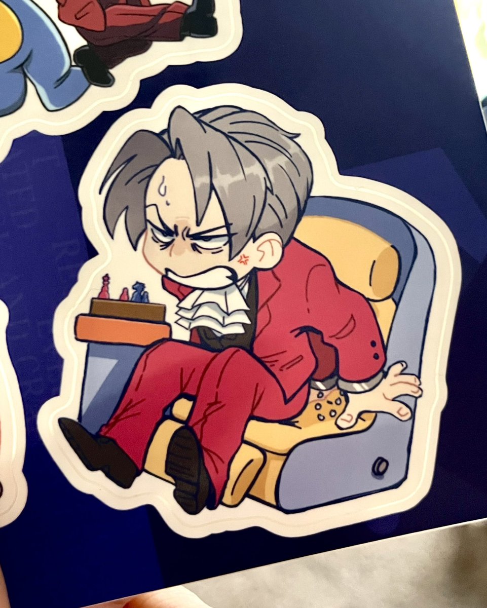 Remember this sticker I made for aai zine today 🥰 in honour of finishing turnabout airlines and seeing Edgeworth struggle in his seat &lt;3
