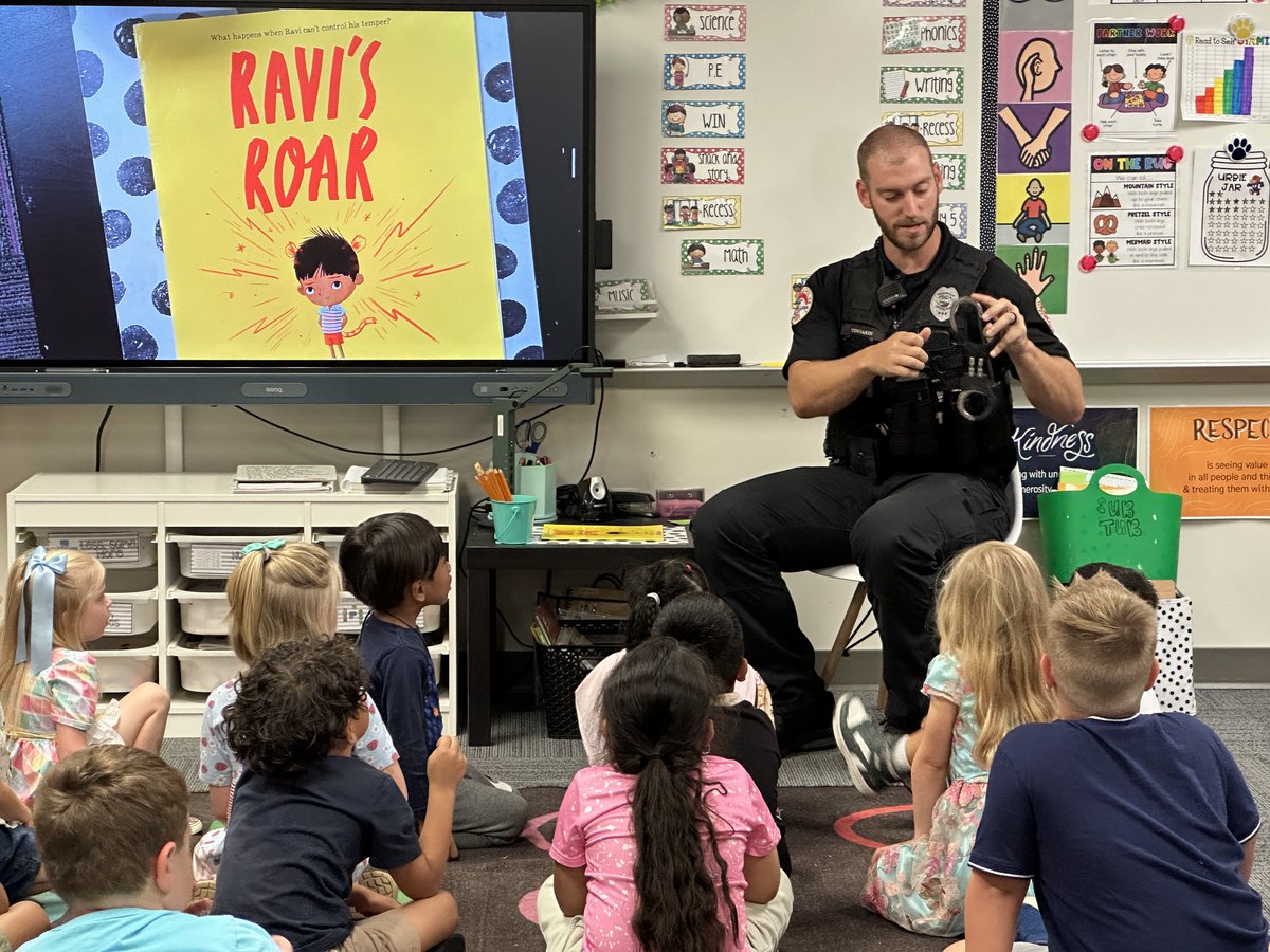 On Wednesday, Kindergarten students at Karen Acres had the opportunity to meet two <a href="/UrbandalePolice/">Urbandale Police Department</a> officers who took time to read to them! Thank you so much UPD! #allaboutU #UCSDPride