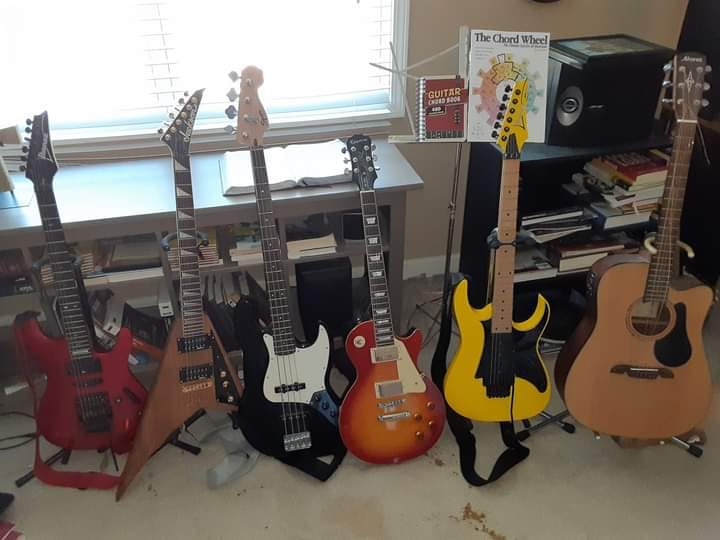 90Rwbrown's tweet photo. @DrGuitar I am an Ibanez man by default... I Love Epiphones too.... far left Ibanez S-series Yellow is an RG series which is my go to guitar also the Les Paul is a go to https://t.co/HaoBvosk0e
