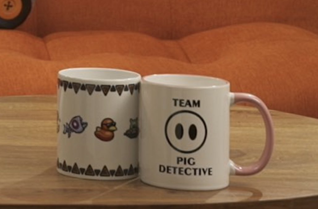 Yoooo, Trip’s Voyage spotted!! <a href="/DetectivePig/">Team Pig Detective (inactive)</a> looks like we’re both immortalized as mugs in the streaming setup 🐱 🐽
