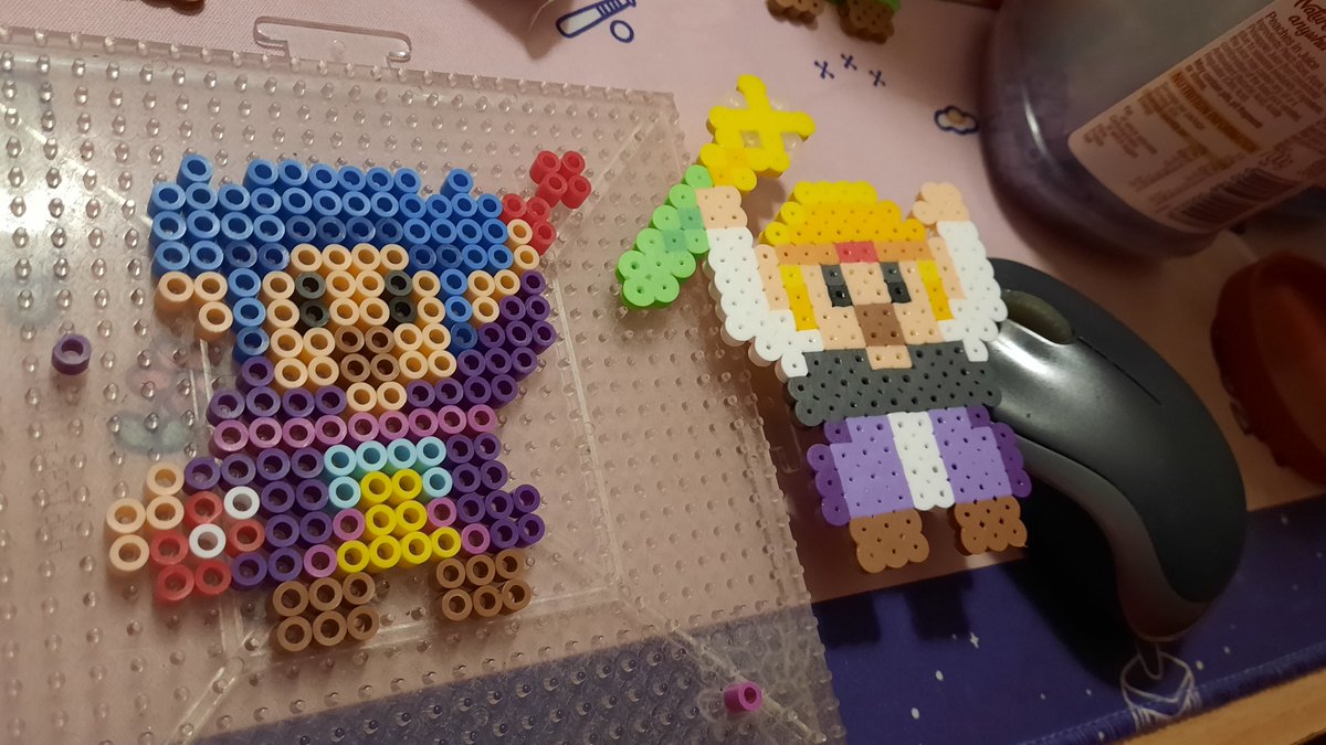 Bless, Minister Lefte. There's something cool about them that on my break I attempted doing a 8-bit version of 'em!
It's hard to apply glasses so I made them they hold it (the other hand being their book), but whether I'll go &amp; iron this - this was a nice recreational exercise <3