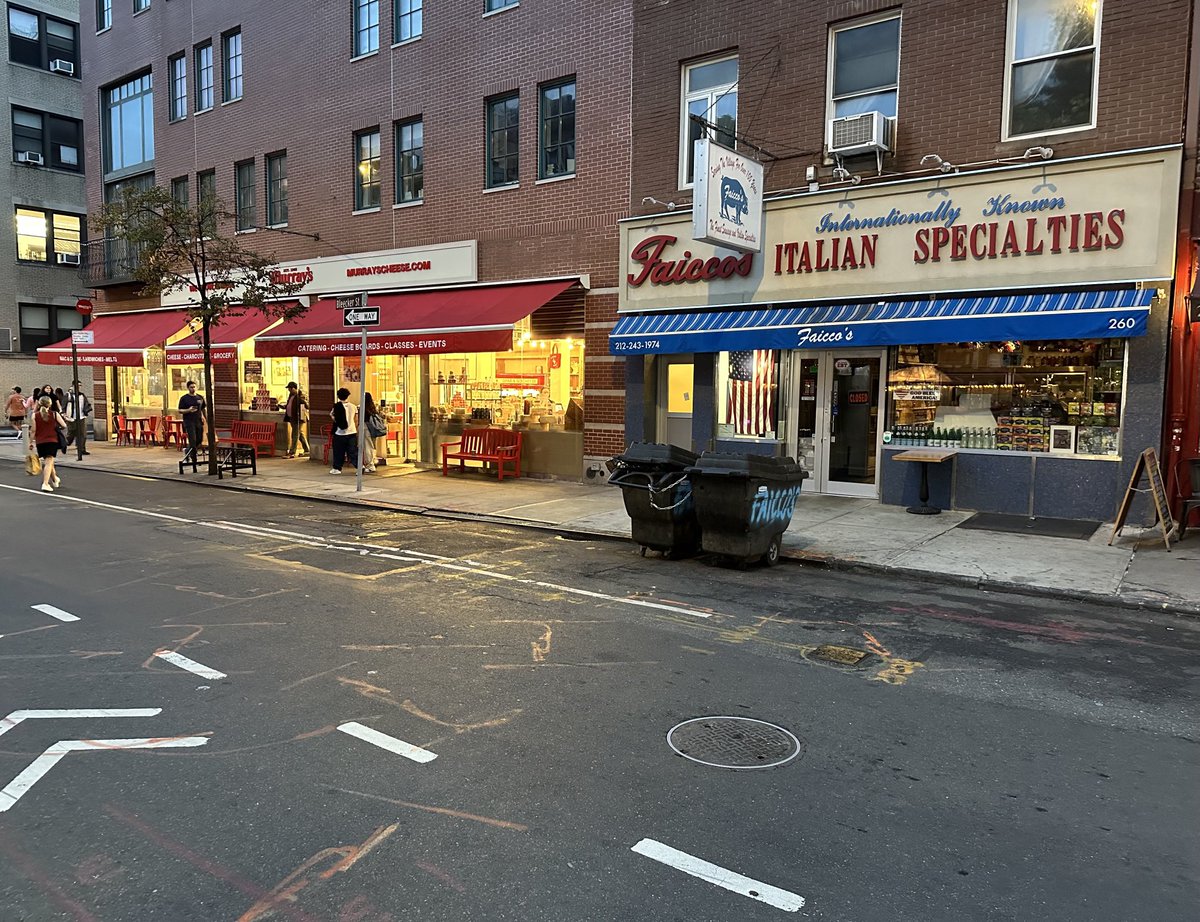 TheTedAllen's tweet photo. One of the greatest blocks on one of the greatest streets (Bleecker) in all of #NYC—the formidable #FaiccosPorkStore and the magnificent temple of funk, #MurraysCheese. I raise a glass! I❤️NY https://t.co/7sIccJoxes