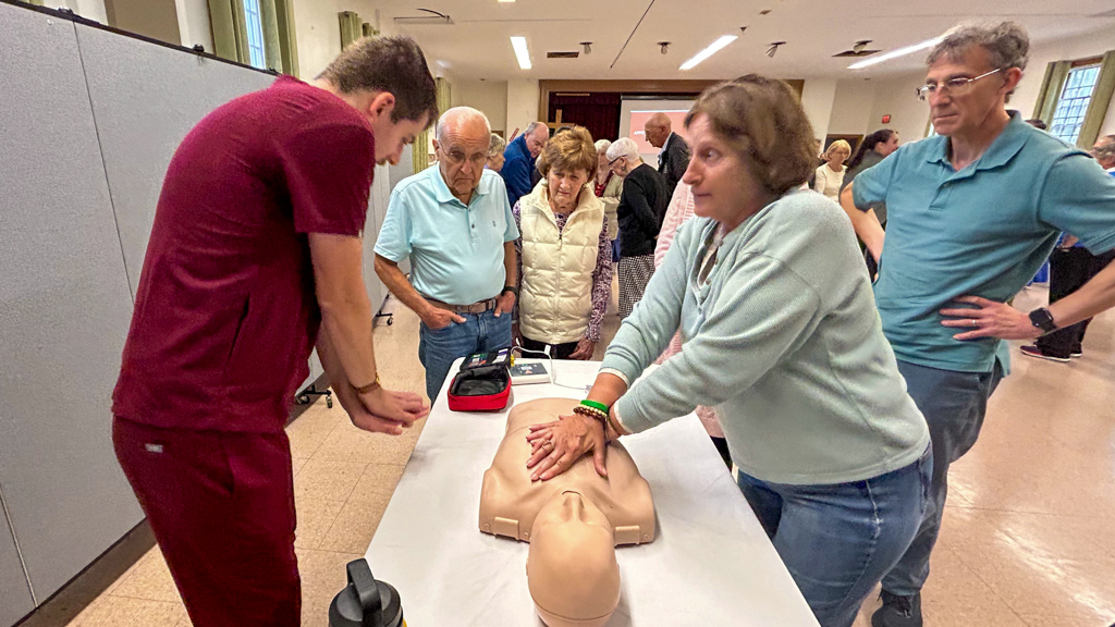 UMassChan's tweet photo. “As medical professionals, it’s important to bring the tools and skill sets needed to help save lives.” – Beatriz Bacelar 

@UMassChan students &amp; staff led a hands-only CPR training session as part of a pilot with the Diocese of Worcester: https://t.co/Ds20p87oEq @UMassEMResearch https://t.co/vqfezA3pSb