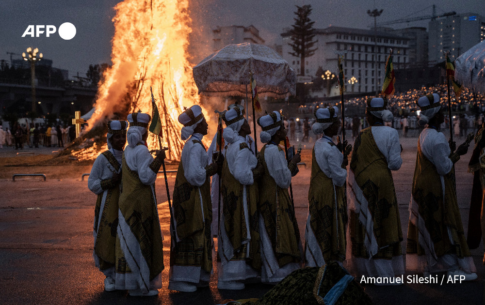 AFP's tweet photo. Faith and fire.

@AFP's Amanuel Sileshi and Michele Spatari photograph the Ethiopian Orthodox holiday of Meskel, in Addis Ababa.

The Ethiopian Meskel celebration is an annual religious holiday in the Ethiopian Orthodox church that commemorates the discovery of the True Cross in the fourth century by the Roman Empress Helena