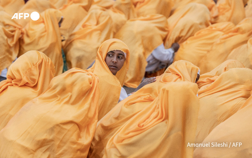 AFP's tweet photo. Faith and fire.

@AFP's Amanuel Sileshi and Michele Spatari photograph the Ethiopian Orthodox holiday of Meskel, in Addis Ababa.

The Ethiopian Meskel celebration is an annual religious holiday in the Ethiopian Orthodox church that commemorates the discovery of the True Cross in the fourth century by the Roman Empress Helena
