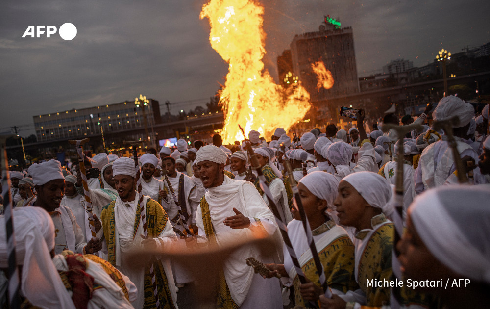 AFP's tweet photo. Faith and fire.

@AFP's Amanuel Sileshi and Michele Spatari photograph the Ethiopian Orthodox holiday of Meskel, in Addis Ababa.

The Ethiopian Meskel celebration is an annual religious holiday in the Ethiopian Orthodox church that commemorates the discovery of the True Cross in the fourth century by the Roman Empress Helena