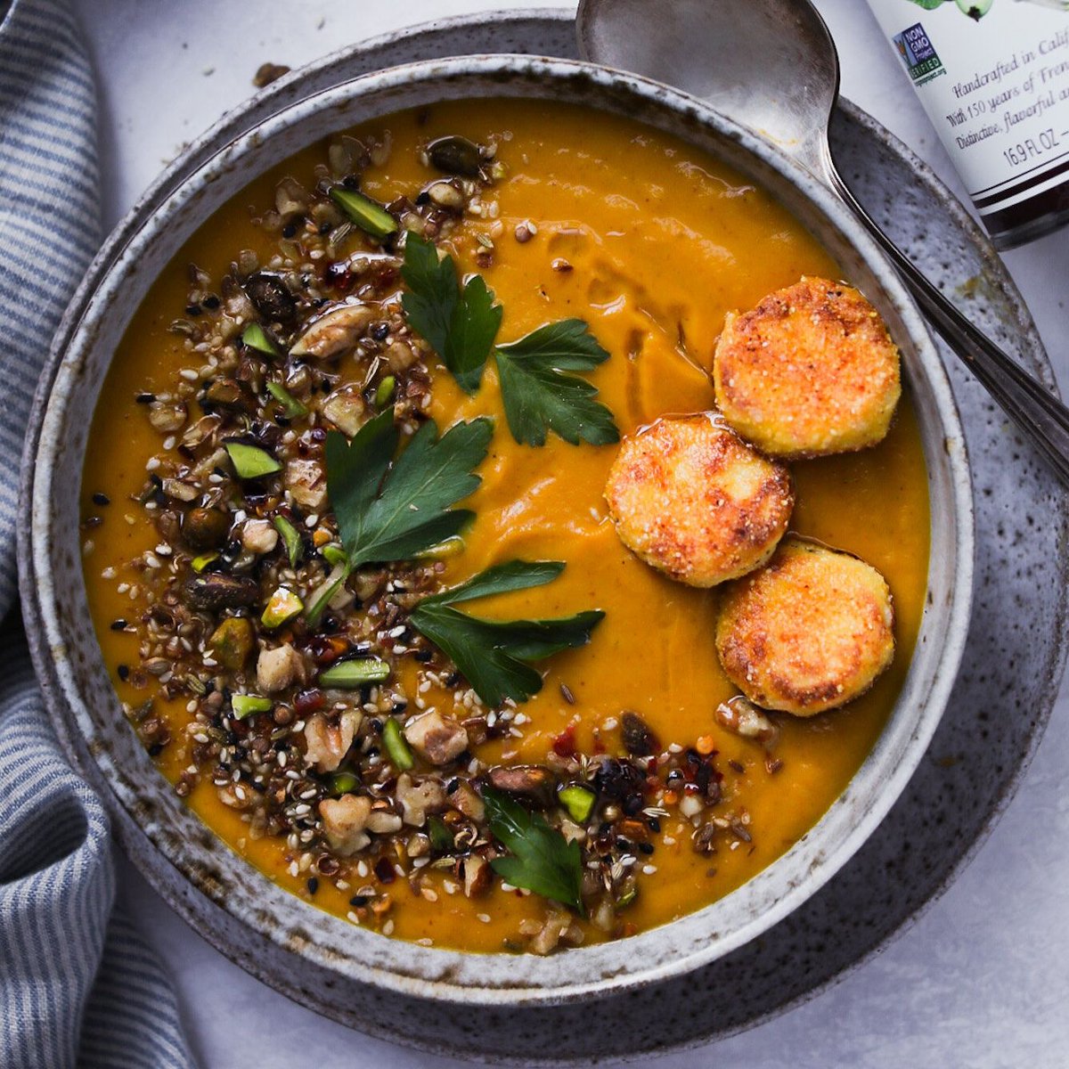 #NuttyRecipe: Roasted Heirloom #PumpkinSoup with #Walnut Dukkah + Fried Chèvre | #feedtheswimmers 🎃🥣

Warm up this season with a holiday-ready Heirloom Pumpkin Soup featuring #WalnutDukkah and Fried Chèvre! 
tinyurl.com/2hc7vzna 
⁠
#jewelsunderthekilt #mapleroastednuts