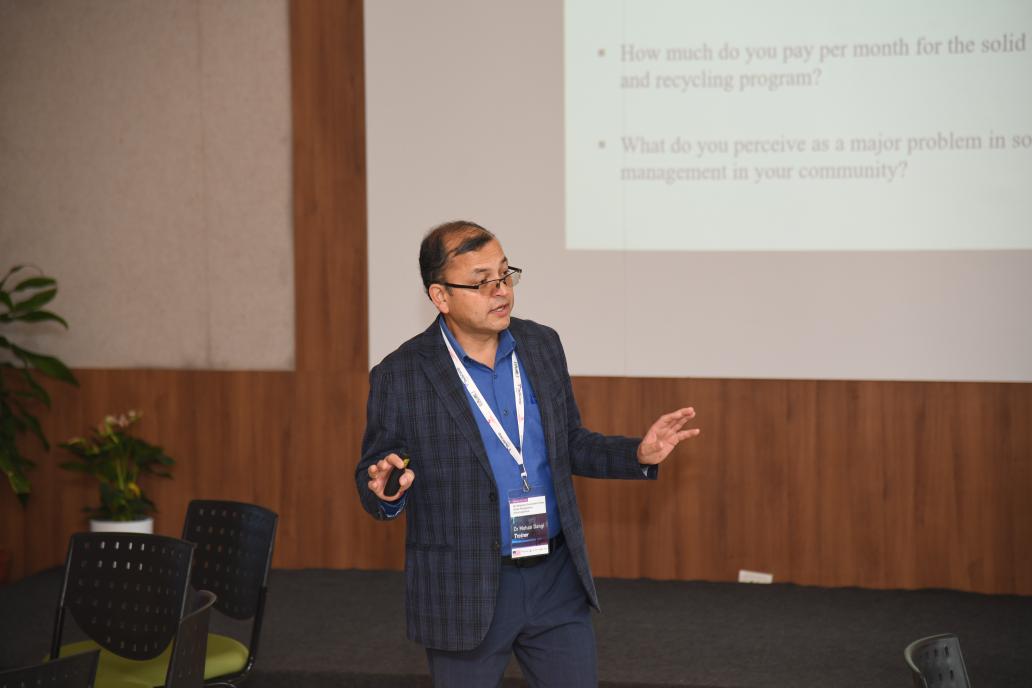 scwrm's tweet photo. Dr. Mohan Dangi from the University of California led a session on Sustainable Urban Waste Management, focusing on the contrasting waste management challenges across India, America, and Nepal. https://t.co/JT4xMefcyl