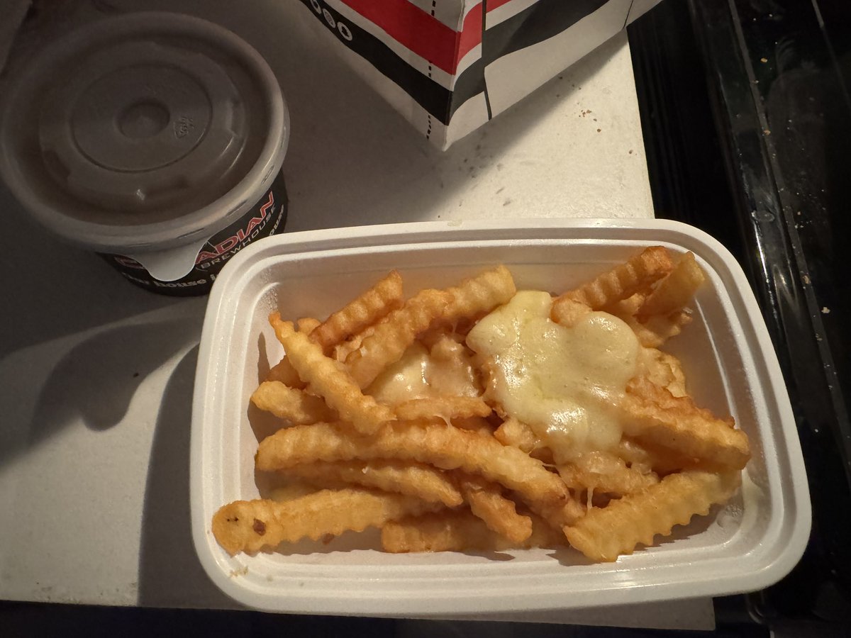 b_regina34's tweet photo. @TheCDNBrewhouse my wife and I ordered delivery tonight from Grasslands location in Regina, and I had ordered a regular size poutine.  To my surprise, this is what arrived. Is this the actual regular poutine for $13??  This is a joke! A bit of  cheese melted on a few fries! https://t.co/gCzGg29Gsa