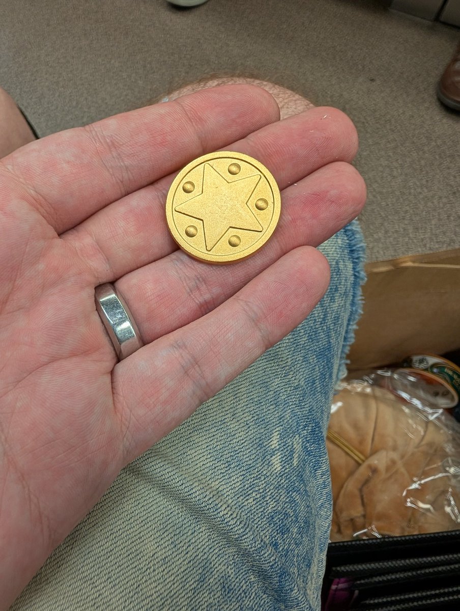 I may have left Dragon Quest island, but I'll forever have this mini medal from the hotel to remember how much fun I had.